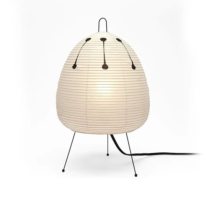 Handmade Nordic-style table lamp with a Japanese rice paper shade and aluminium base on a wooden table