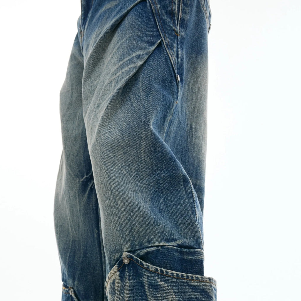 Men's verdant blue loose fit jeans with retro washed finish and curved knife design detail