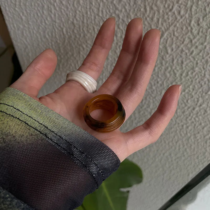 Chinese style irregular geometric wide resin ring in brown or white latte colour.