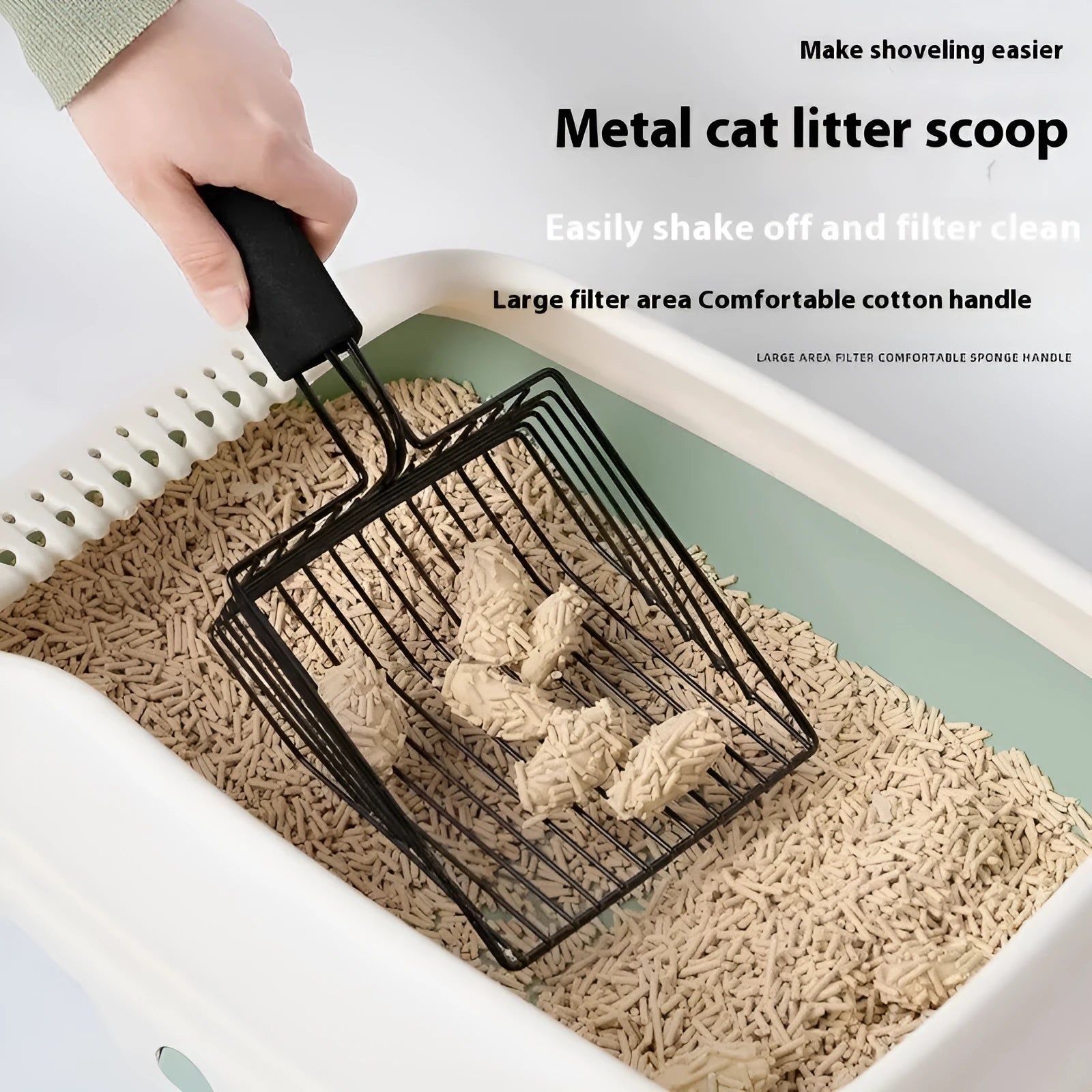 Black metal cat litter scoop with 0.8cm gaps between perforations