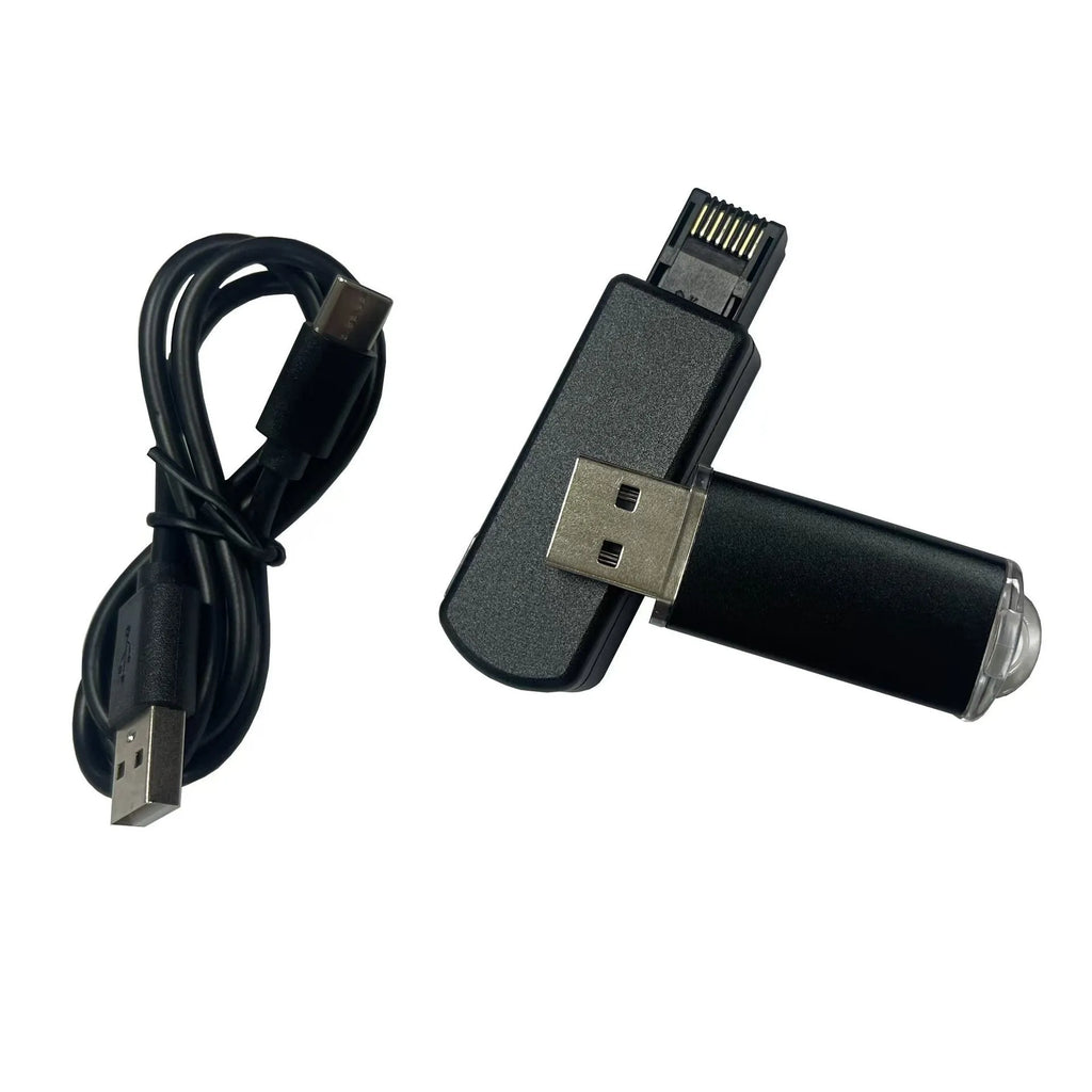 Black JB Tool USB host adapter with aluminum alloy body next to data cable and manual.