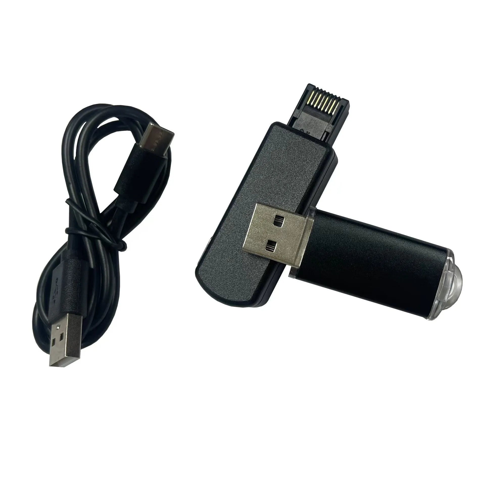 Black JB Tool USB host adapter with aluminum alloy body next to data cable and manual.