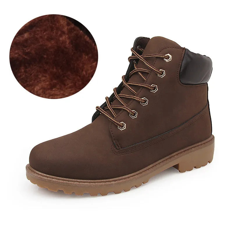 Men's pink high-top Martin boots with front lace-up and a low flat heel on a neutral background.