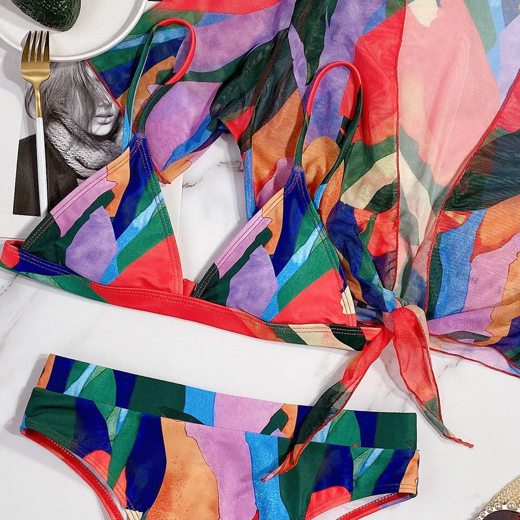 Red women's split swimsuit with print for swimming and casual surfing.