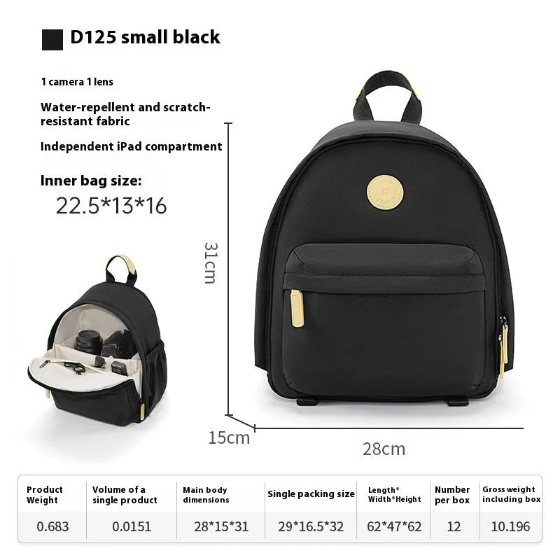 Women's polyester shoulder camera bag in black with a curved strap and detachable iPad pocket.