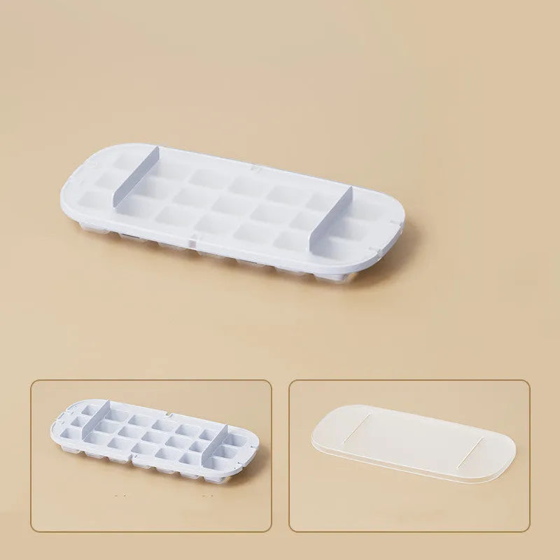 Colourful ice cube tray with grid design and integrated ice shovel storage compartment