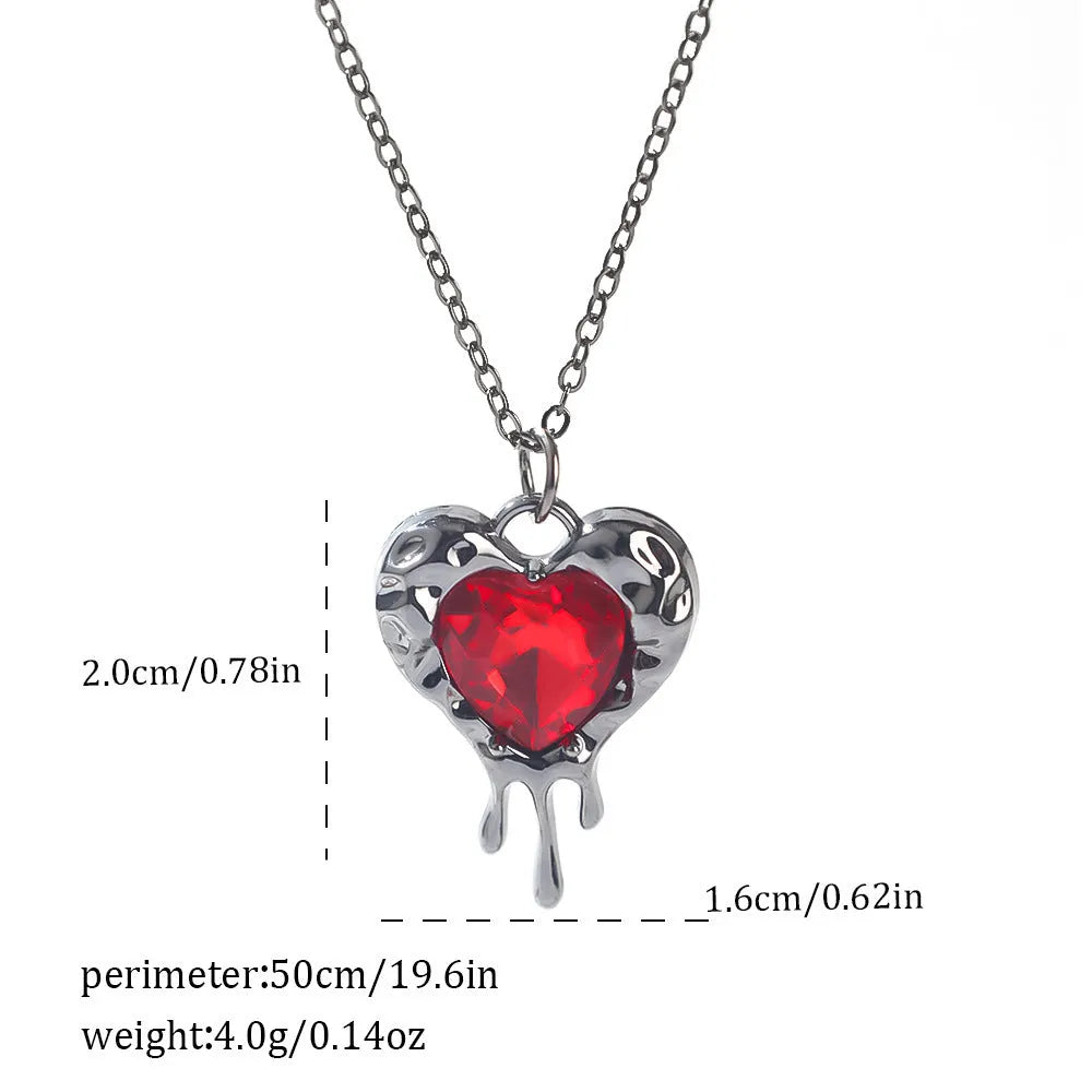 Gothic Halloween necklace with spider and bat alloy pendant on a chain.