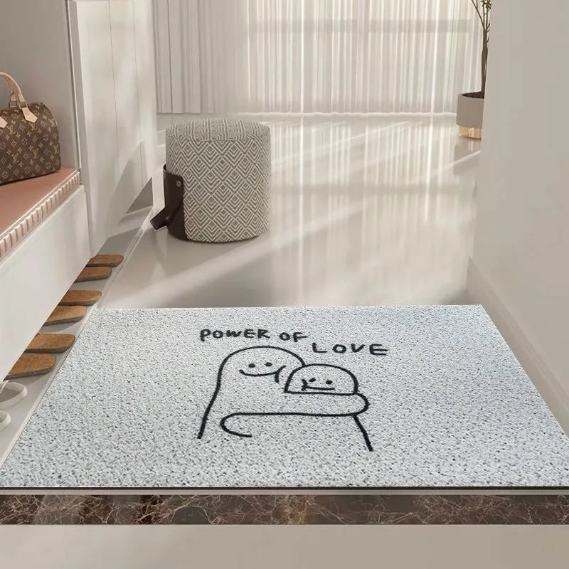 Square PVC floor mat with a cartoon face and geometric pattern in Mr. Big Nose colour.