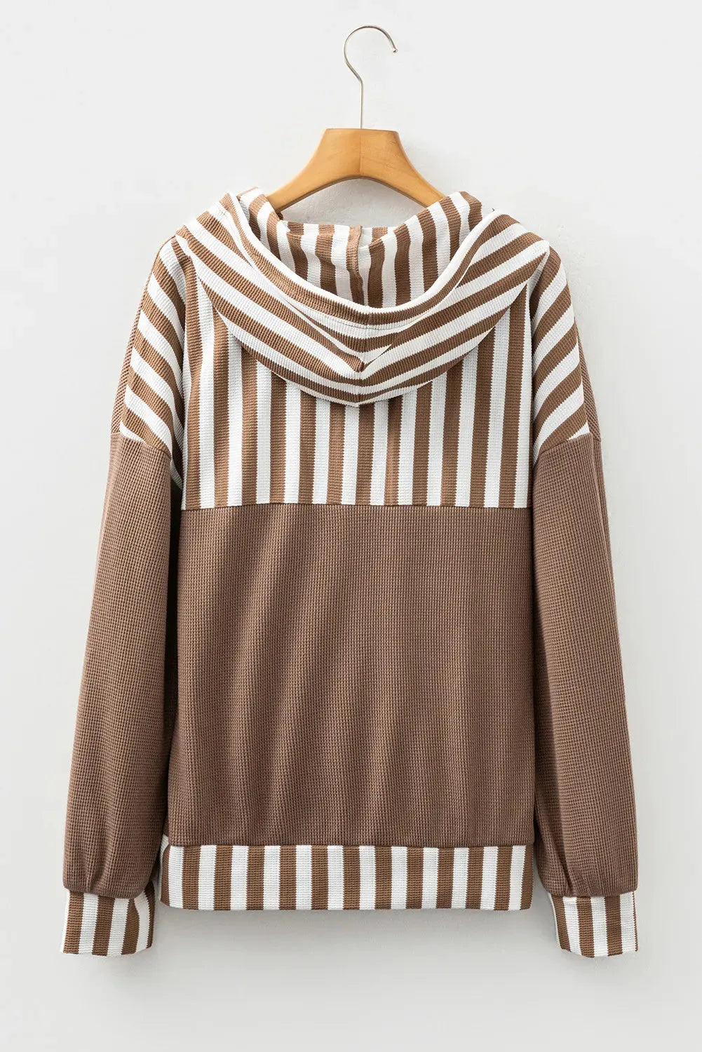 Straw yellow hoodie with waffle texture fabric, striped patchwork panels, button neck, and drawstring waist.