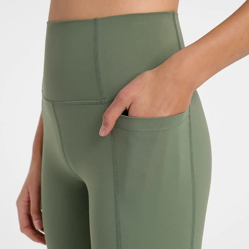 Women's black cotton blend super stretch sports shorts with mid-rise waist and short length.
