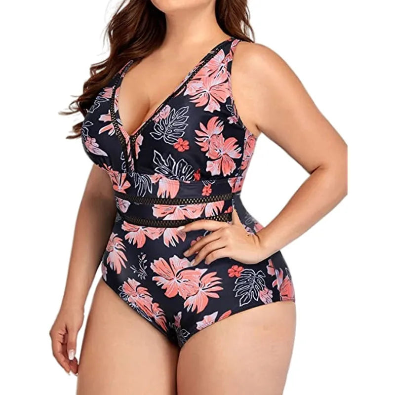Black print plus size women's bikini swimsuit made from polyester mesh fabric, showing sleeveless design.