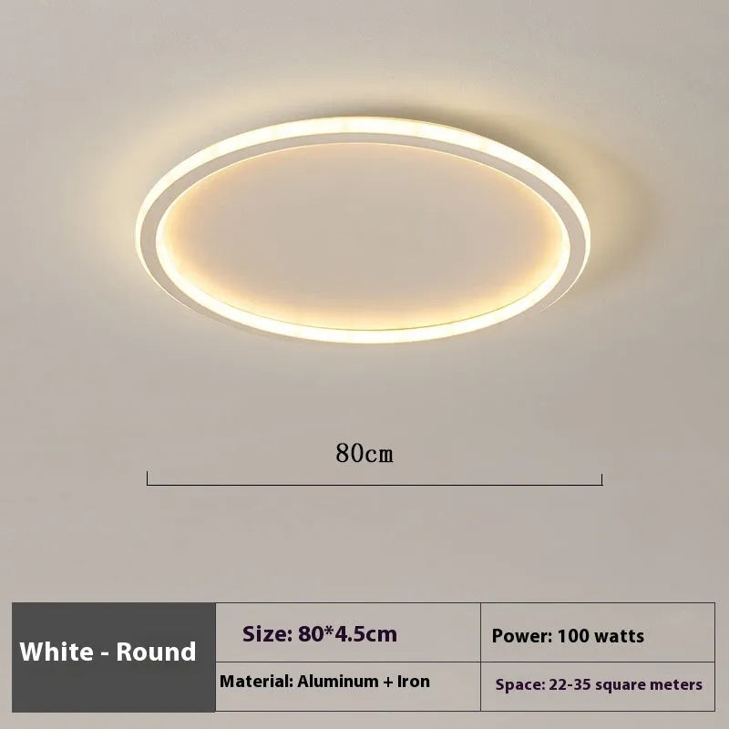 Minimalist circular LED ceiling lamp in black, gold or white finish with adjustable lighting options
