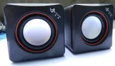 Small black square computer speaker with USB cable for PC connection