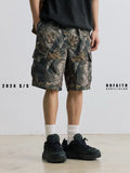 Loose casual straight-leg denim shorts in army green with a zip fly and elasticated waistband.