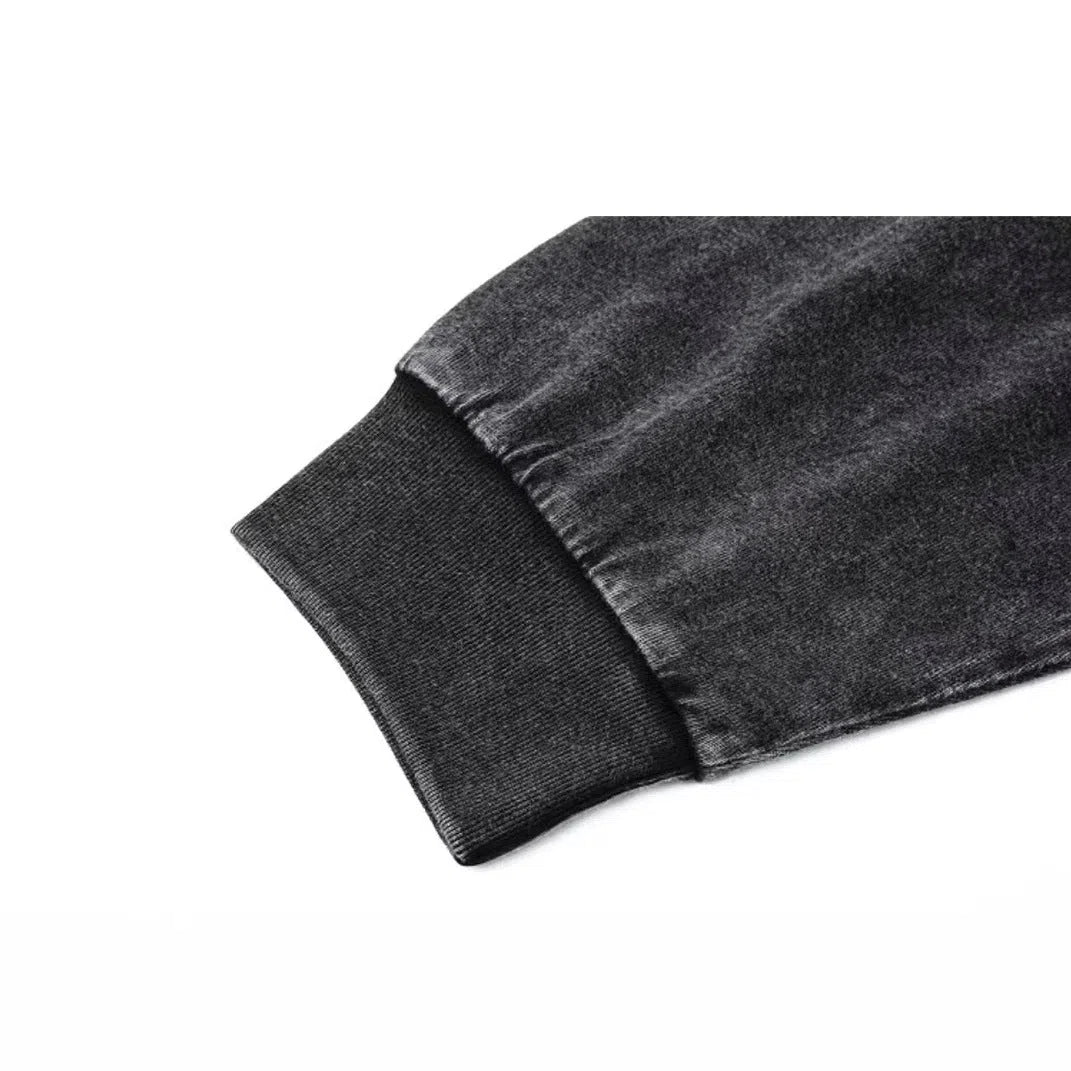 Black pure cotton washed retro long-sleeved T-shirt with loose fit and distressed details, front view