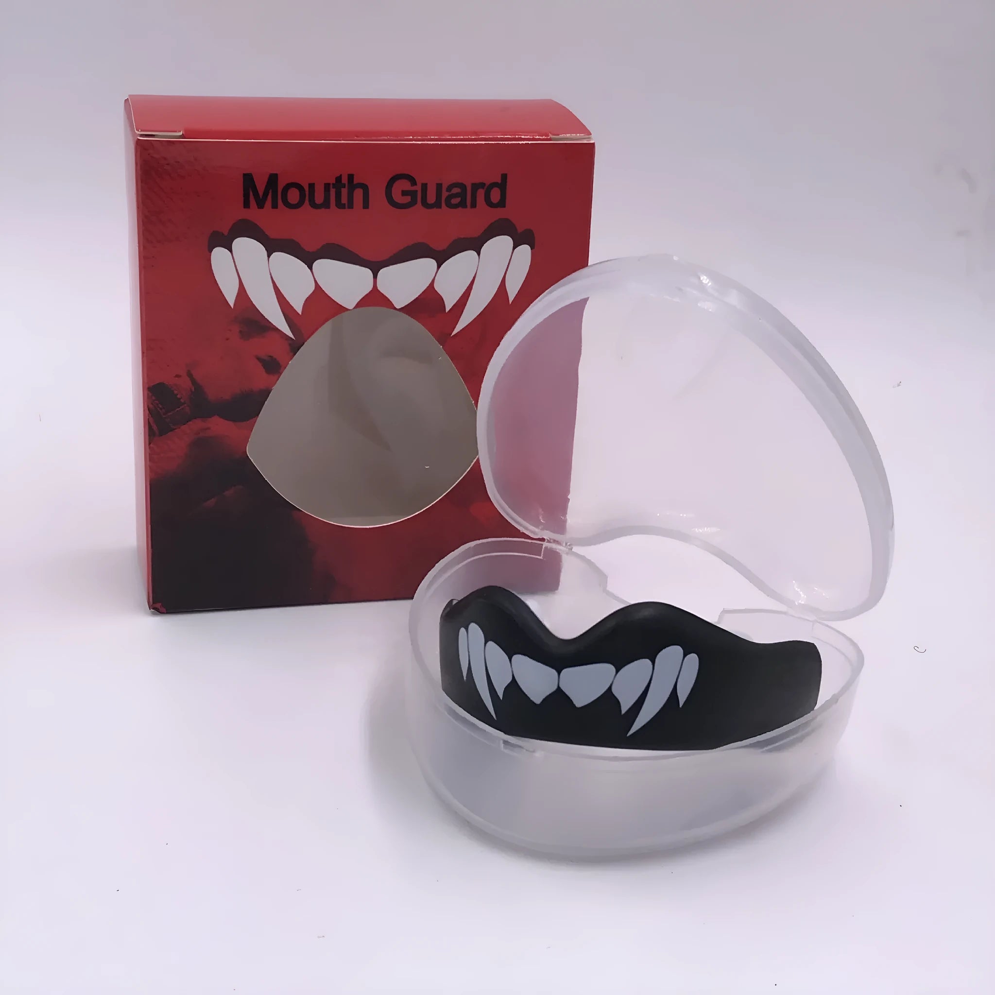 Adult boxing mouthguard with tooth socket design in black and white, red and white, and blue and white colour options.
