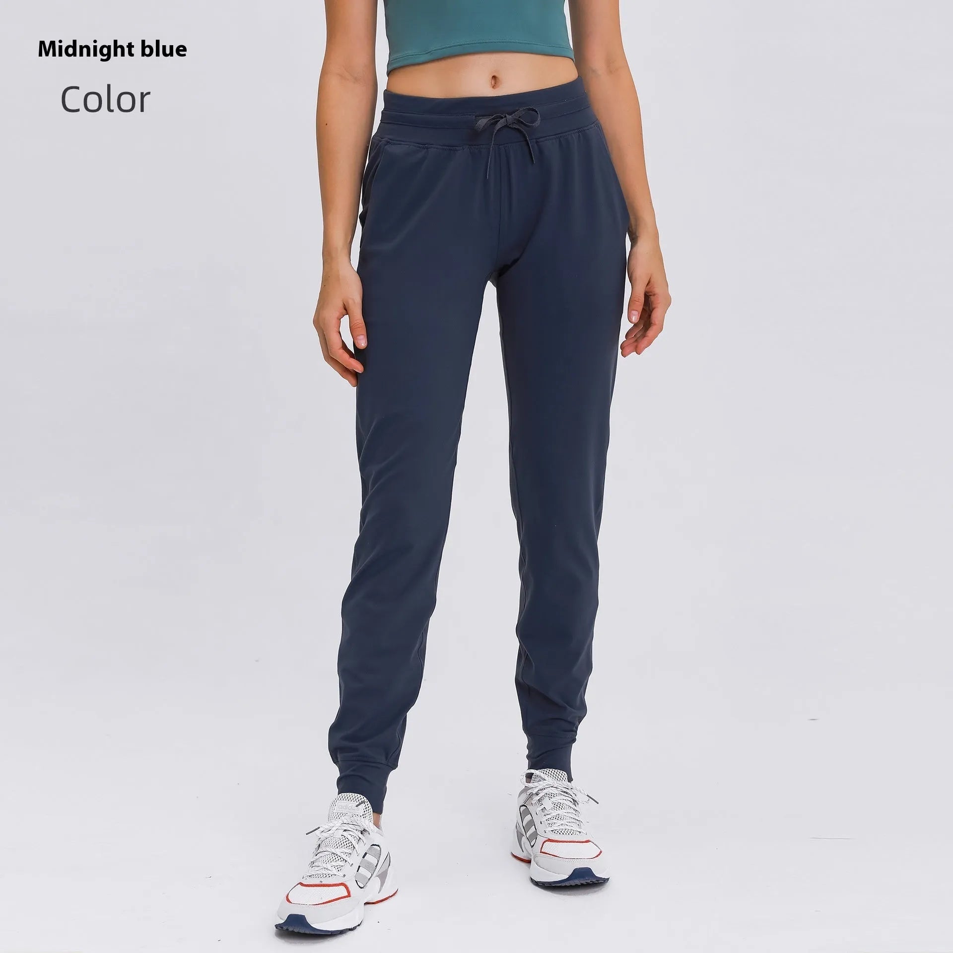 Women's high-waist yoga pants with drawstring waistband in distilled coffee colour, suitable for fitness.