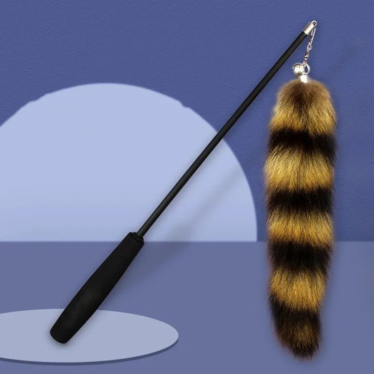 Black elastic cat wand teaser toy with long string for interactive play with kittens and cats.