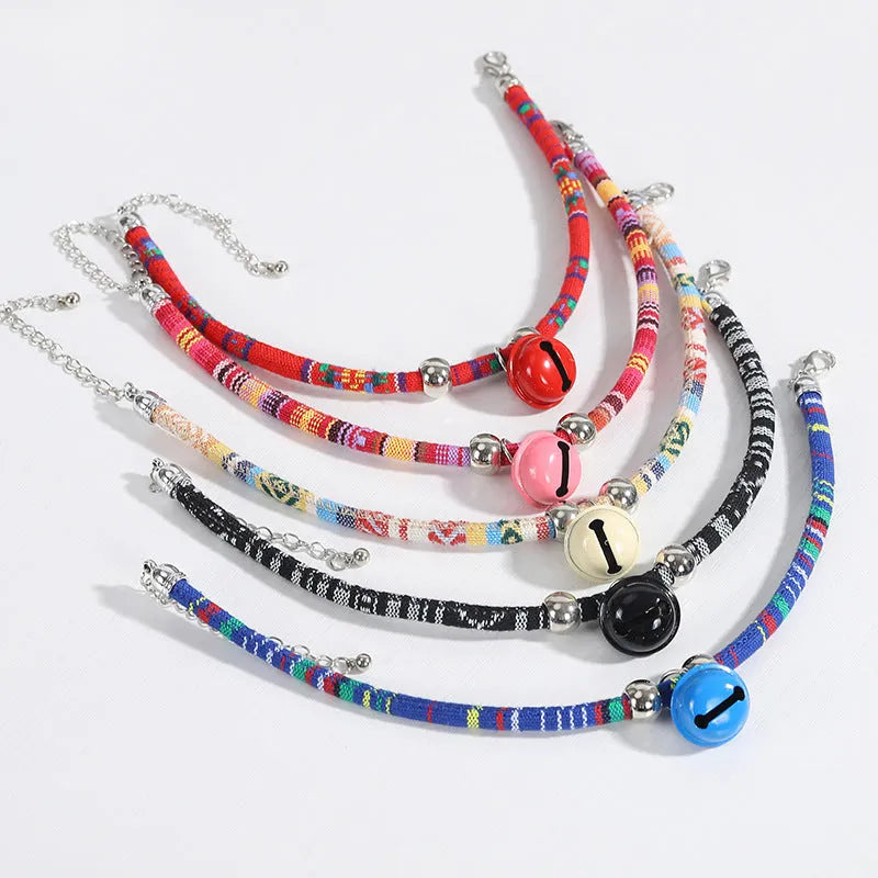 Ethnic pattern pet collar with bell attachment in multiple colour options including black blue pink red white