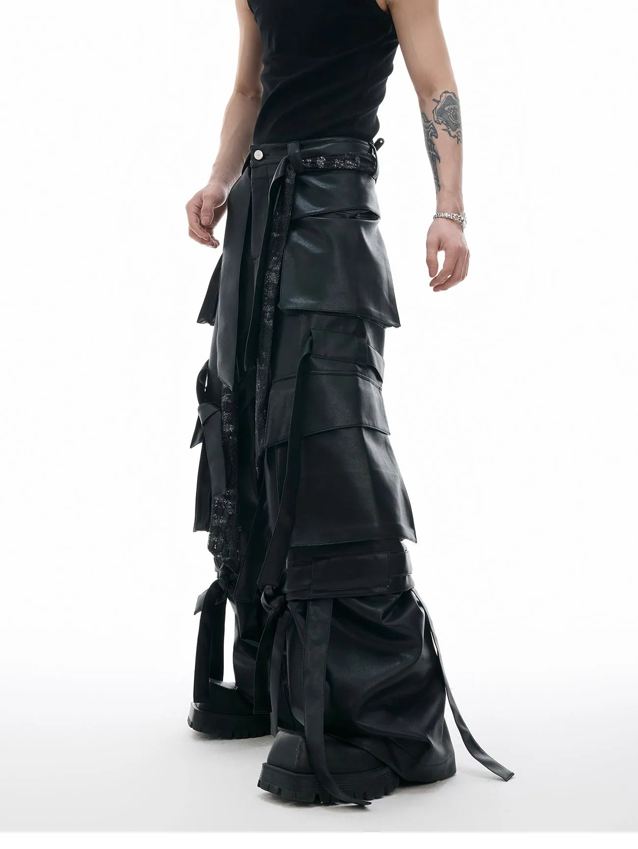 Black loose fit men's retro pants with quilted ribbon detailing and multiple pockets