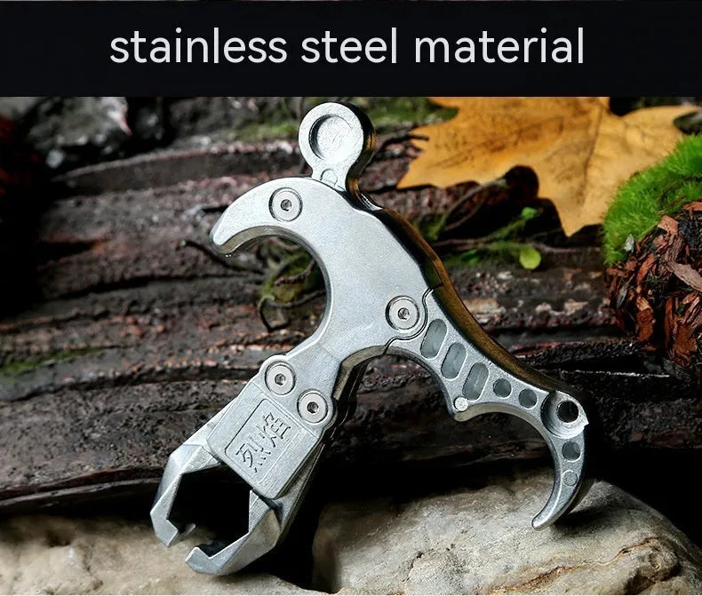 Zinc alloy archery release aid with a two-axis harpoon clip mechanism and stainless steel component.