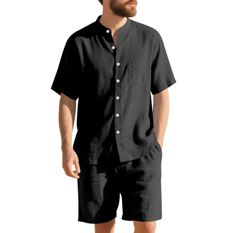Men's light blue linen blend summer suit with henry collar, short sleeves, and matching shorts