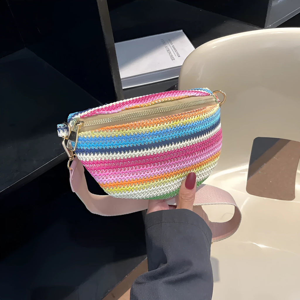 Women's woven straw beach bag in bohemian style, available in pink or blue colour with single shoulder strap