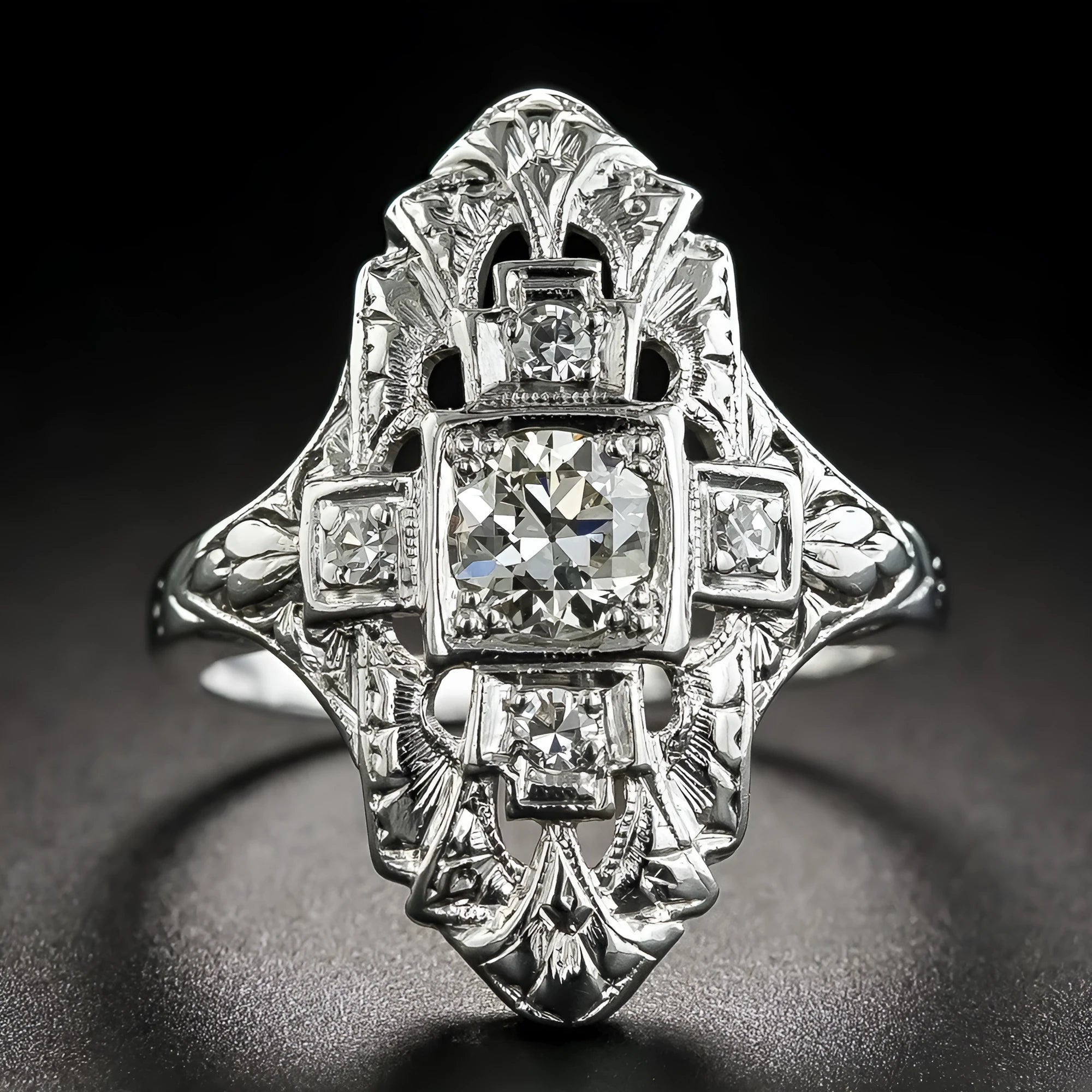 Geometric pattern hollow-out silver plated ring with diamond studs on a copper base.