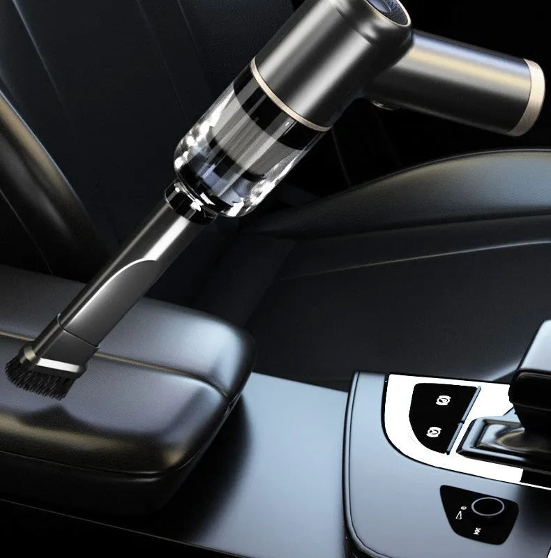 Black wireless handheld car vacuum cleaner with tyre inflation function and multiple attachments