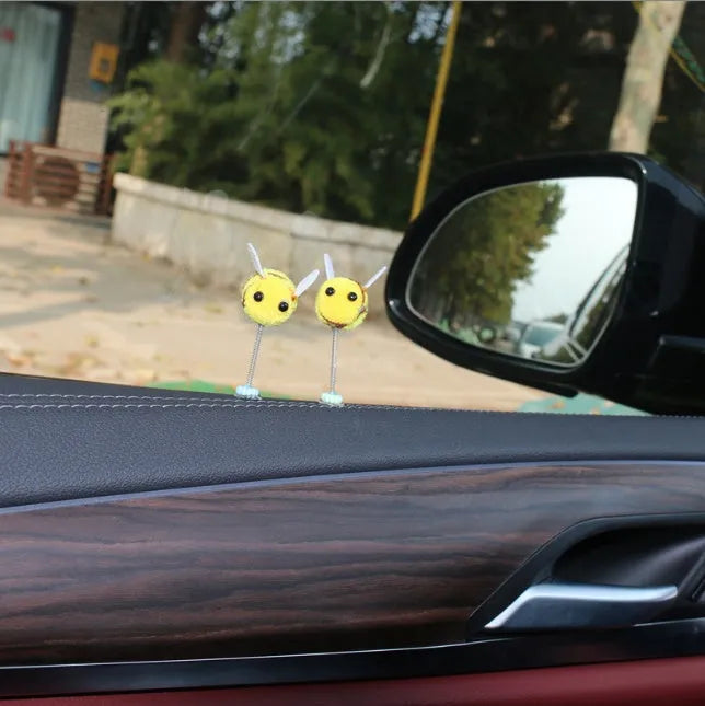 Swing spring bee car decoration with fur ball construction and cartoon design measuring 3x3cm