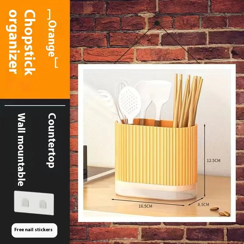 Plastic wall-mounted chopsticks basket with cross-border drain design in beige, dark green, or orange.