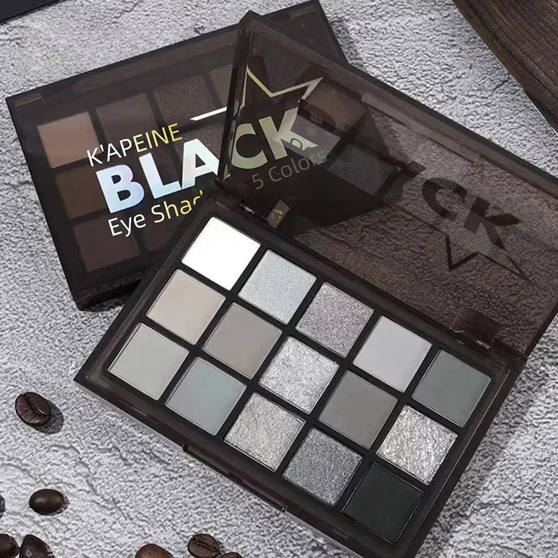 15-colour eye shadow palette showing grey, black, brown and blue shades for smoky makeup