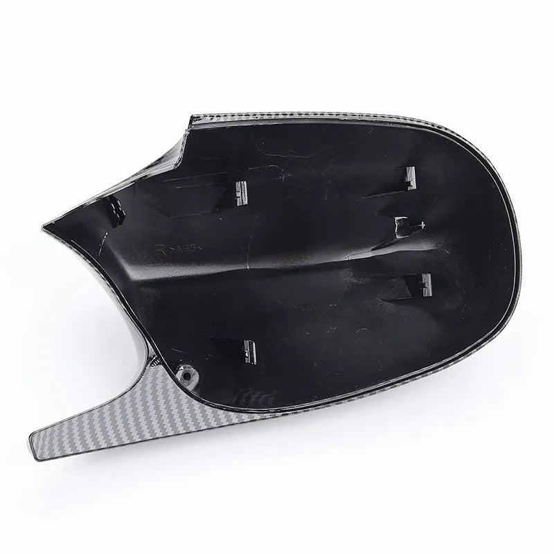Pair of black ABS plastic rearview mirror housings for BMW 3 Series E90 model.