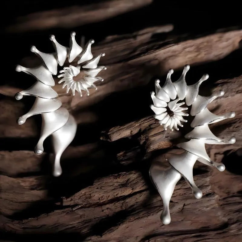 Exaggerated conch three-dimensional matte drop earrings in electroplated alloy metal