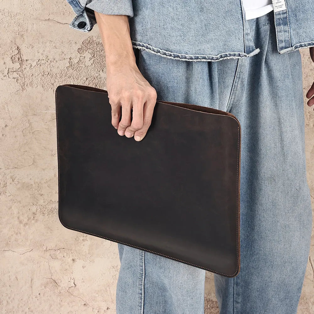 Genuine crazy horse leather computer liner bag in brown colour showing organisational compartments