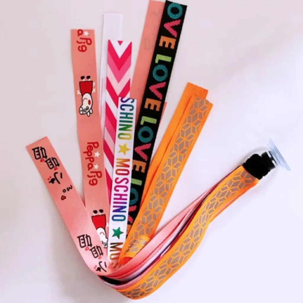 Close-up of a colourful decorative ribbon streamer attached to a child's helmet for roller skating or skiing.