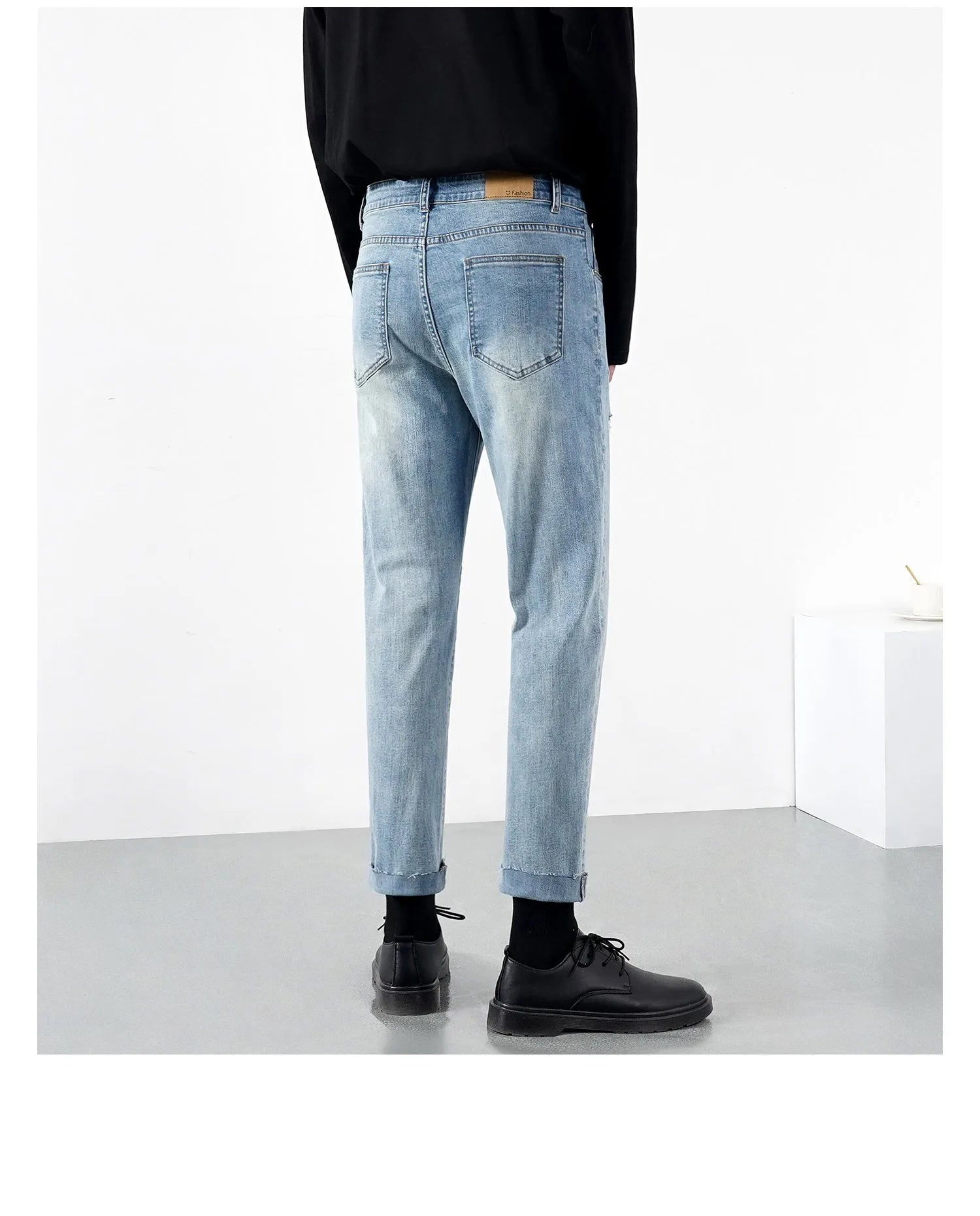 Men's light summer ripped jeans in blue regular denim with microelastic stretch and distressed detailing