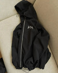 Men's grey British-style loose fit hooded sunscreen jacket made from polyester fabric