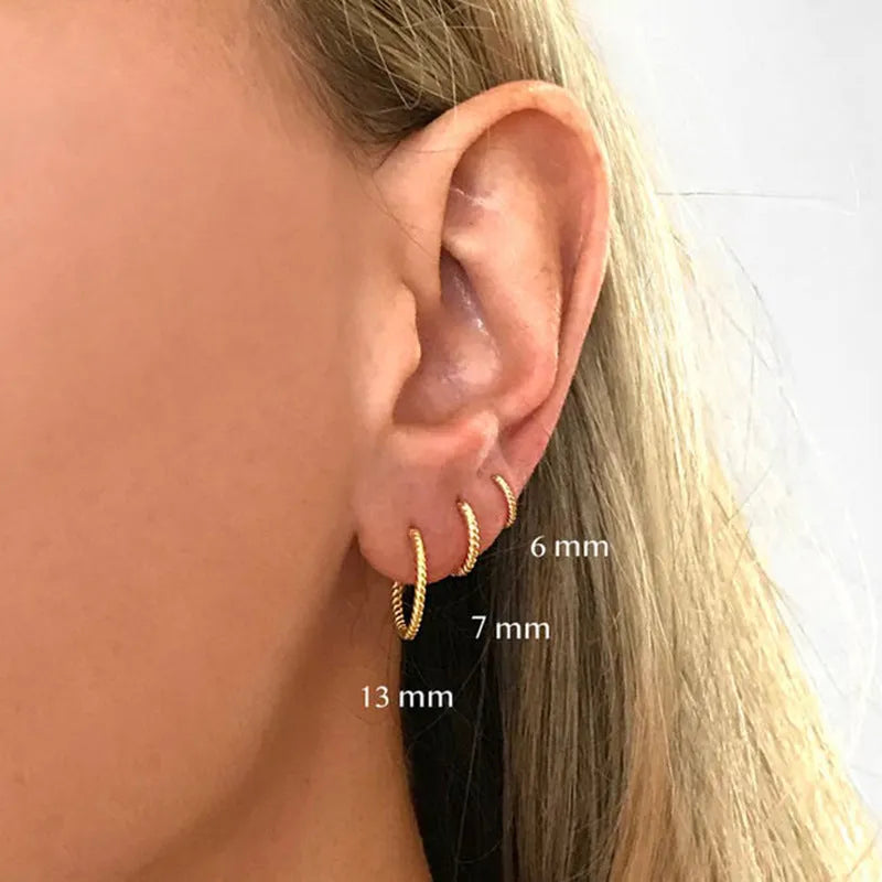 Sterling silver twisted string round earrings in gold or white gold colour