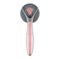 Grey, green, and pink self-cleaning slicker brush for cats and dogs with a non-slip handle.