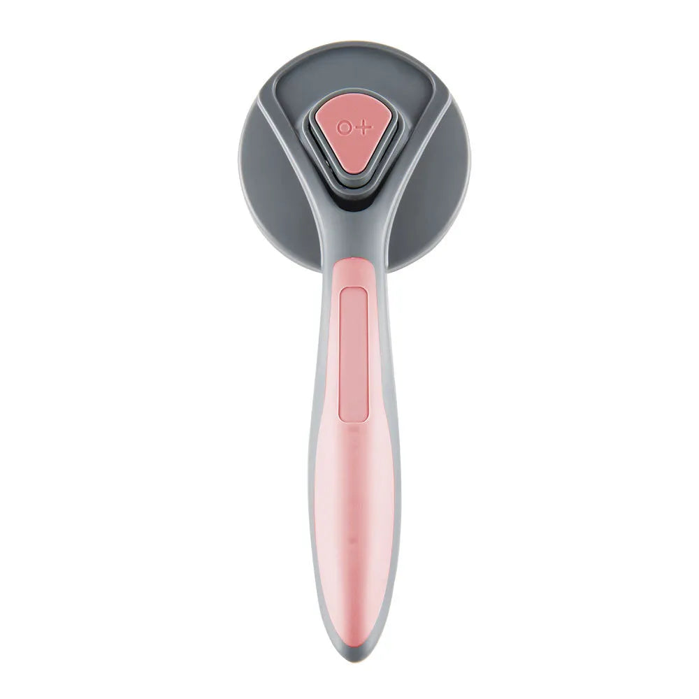 Grey, green, and pink self-cleaning slicker brush for cats and dogs with a non-slip handle.