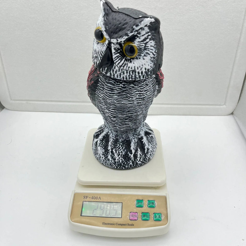 Artificial plastic owl bird scare ornament with moveable head for outdoor garden pest control
