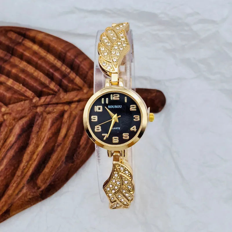 Women's stainless steel watch with round dial showing gold surface option and vachette clasp buckle