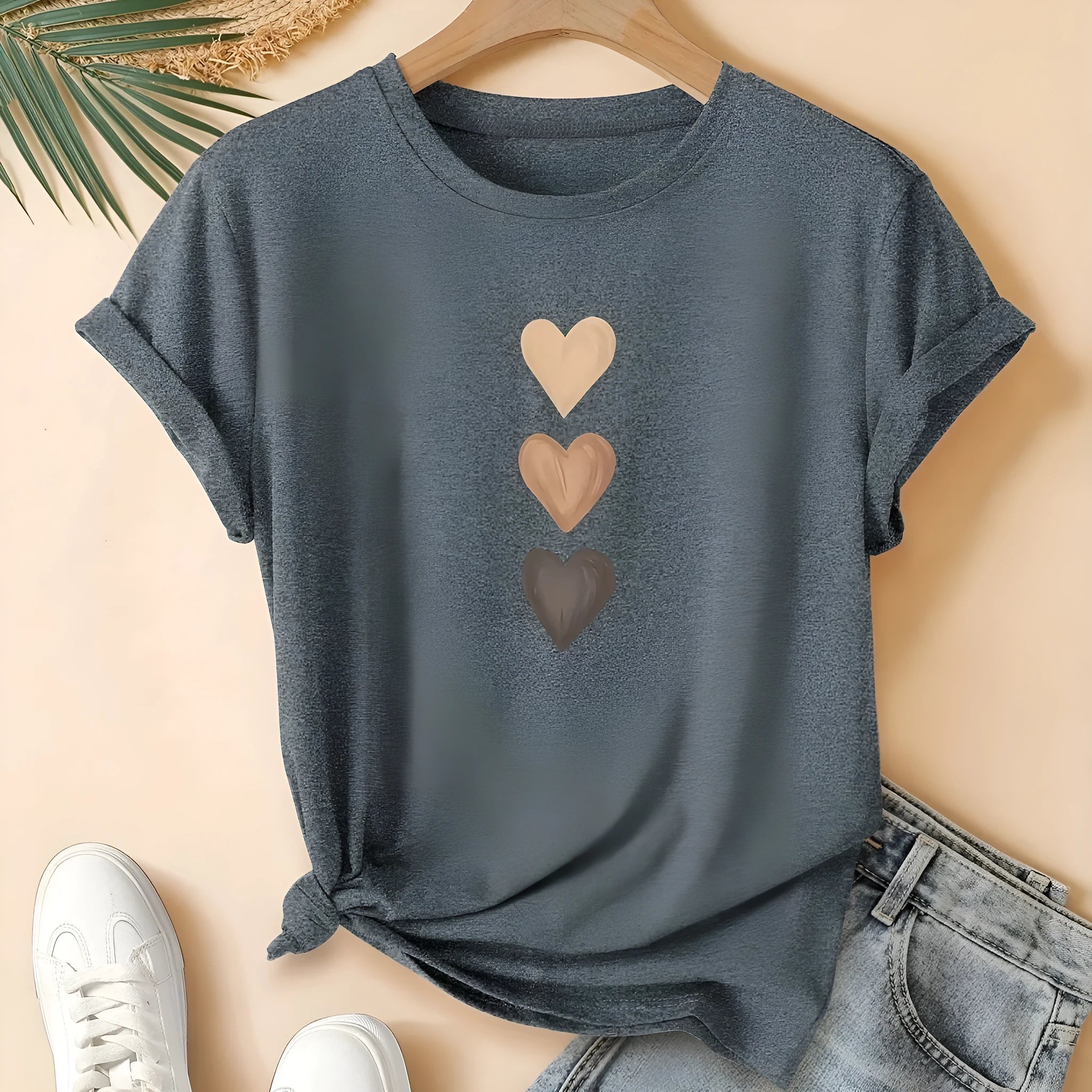 Women's art retro style printed cotton short sleeve T-shirt on a hanger.