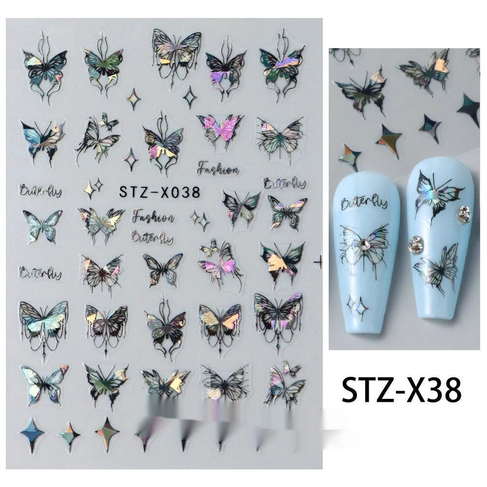Plastic sheet of black, silver, and cartoon design nail art stickers for DIY manicures.