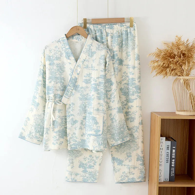 Women's pink pure cotton gauze long sleeve lounge suit top and trousers on a hanger.