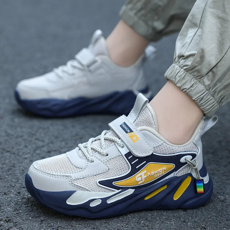 Boys' dark blue and black platform sports running shoes with Velcro strap and mesh upper.