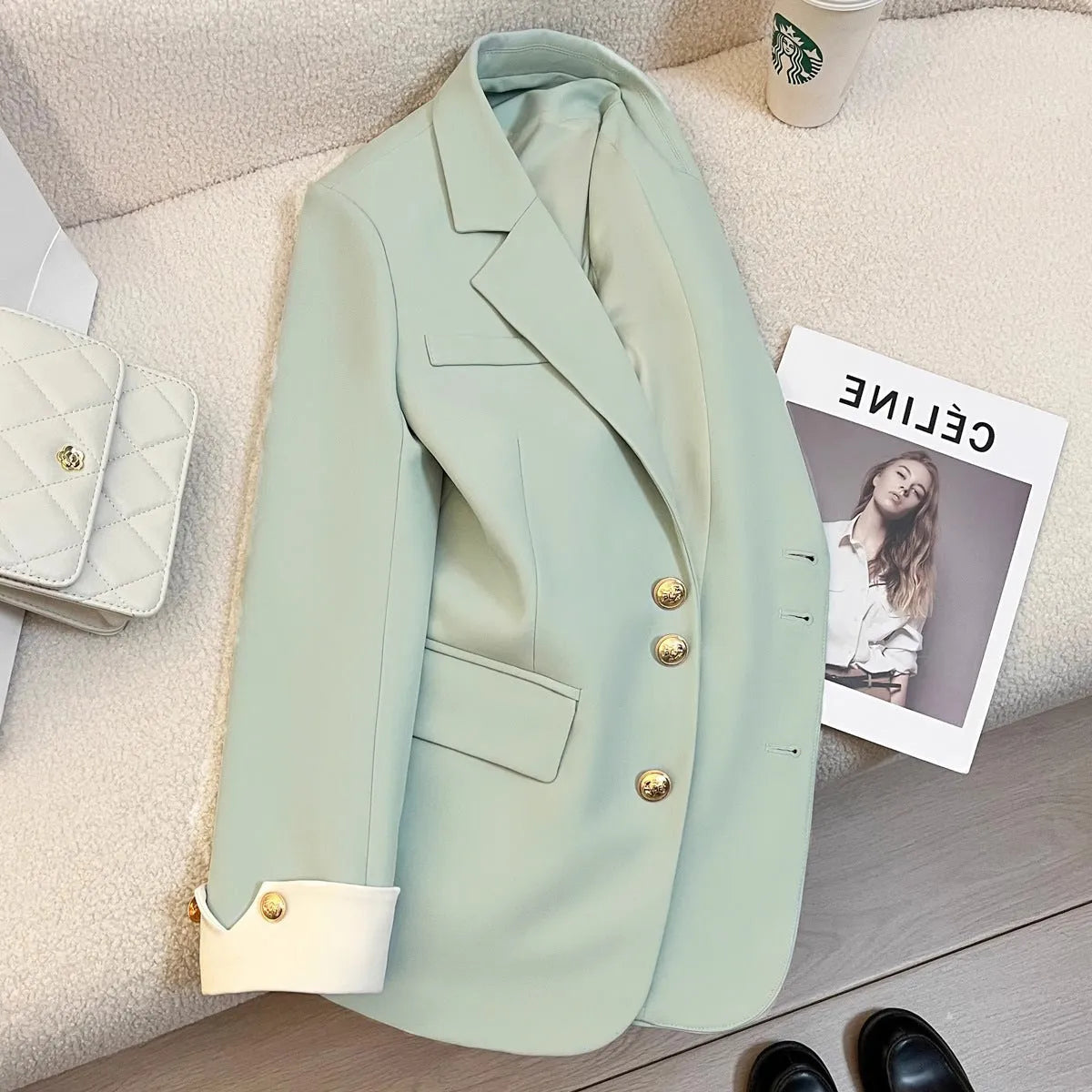 Beige Korean-style loose fit mid-length women's coat with long sleeves and pockets.