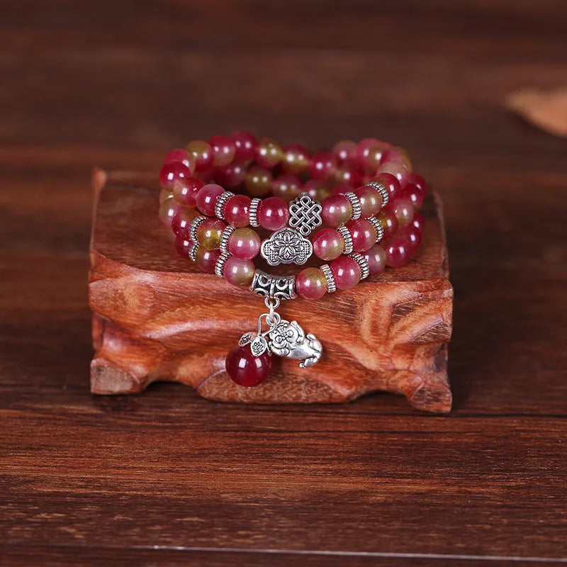 Watermelon crystal bracelet with Chinese knot fastening in 6mm or 8mm style options