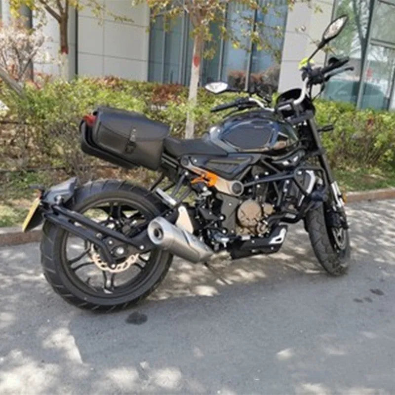 Black motorcycle swingarm side saddlebag mounted on Harley Davidson Sportster